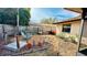 View of backyard featuring seating and planting areas and a privacy fence at 1670 Monterey Dr, Clearwater, FL 33756