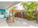 Backyard gazebo area with lush tropical landscaping provides a shady retreat at 4643 Bay Crest Dr, Tampa, FL 33615