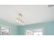 Bedroom features light blue walls and large windows at 4643 Bay Crest Dr, Tampa, FL 33615