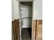 A storage closet featuring built in shelving at 50 Acacia St, Clearwater Beach, FL 33767