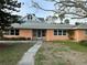 Inviting single-Gathering home with a well-manicured lawn, charming curb appeal, and a comfortable vibe at 50 Acacia St, Clearwater Beach, FL 33767