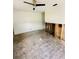 Living room showcasing a ceiling fan, and natural light at 50 Acacia St, Clearwater Beach, FL 33767