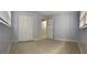 Bedroom with tiled floors and closet at 5729 13Th St, Zephyrhills, FL 33542