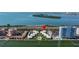 Aerial view of condo community on the water with a pin denoting property location at 7300 Sunshine Skyway S Ln # 202, St Petersburg, FL 33711