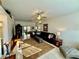 Bright living room with tile floors, ceiling fan, neutral colors and lots of sunlight at 9337 Zamora Dr, New Port Richey, FL 34655