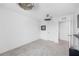 Bedroom with neutral colors and two ceiling fans at 11616 Little River Way, Parrish, FL 34219