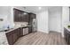 Kitchen boasts granite countertops, stainless steel appliances, and ample storage space at 11616 Little River Way, Parrish, FL 34219
