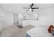 Open loft area featuring neutral colors and a cozy carpet at 11616 Little River Way, Parrish, FL 34219