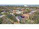 Community aerial view featuring beautiful homes and tree coverage at 1764 Oak Spring Dr, Tarpon Springs, FL 34689