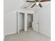 Bedroom with closet and doorway at 1764 Oak Spring Dr, Tarpon Springs, FL 34689