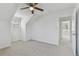 Bedroom with window, doorway, and carpeted floor at 1764 Oak Spring Dr, Tarpon Springs, FL 34689