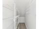 Efficient storage space with wire shelving, perfect for organizing and maximizing storage solutions throughout the home at 1764 Oak Spring Dr, Tarpon Springs, FL 34689