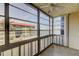 The airy enclosed lanai offers peaceful views of the pool and harbor at 19701 Gulf Blvd # 328, Indian Shores, FL 33785