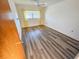 Bedroom featuring a window and modern flooring, ideal for a serene and minimalist lifestyle at 6075 Shore S Blvd # 605, Gulfport, FL 33707