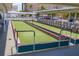 Outdoor bocce ball court with seating, offering a leisurely activity for residents and guests to socialize at 6075 Shore S Blvd # 605, Gulfport, FL 33707