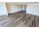 An open living room shows a neutral color palette, modern floors, and an open floor plan at 6075 Shore S Blvd # 605, Gulfport, FL 33707
