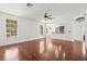 Bright living room with hardwood floors, seamlessly connected to the stylish kitchen area at 6211 S Macdill Ave # 1, Tampa, FL 33611