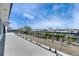 Wide angle view from the balcony showcasing clear glass railings and neighborhood views at 6538 Simone Shores Cir, Apollo Beach, FL 33572