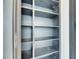 Open shelving in the closet offers plenty of storage space in a modern finish at 6538 Simone Shores Cir, Apollo Beach, FL 33572