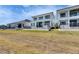 Spacious backyard featuring modern homes at 6538 Simone Shores Cir, Apollo Beach, FL 33572
