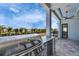 Covered outdoor kitchen area with a stainless steel grill at 6538 Simone Shores Cir, Apollo Beach, FL 33572