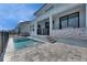 A stunning backyard featuring a pool and a modernly designed home at 6538 Simone Shores Cir, Apollo Beach, FL 33572