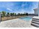 Backyard pool with patio and fencing at 6538 Simone Shores Cir, Apollo Beach, FL 33572