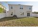 Large backyard featuring ample green space and partial fencing, perfect for outdoor activities at 2604 Knight Island Dr, Brandon, FL 33511