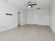Spacious bedroom with light wood floors and white walls, offering a clean and bright atmosphere at 2604 Knight Island Dr, Brandon, FL 33511