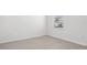 Bedroom featuring light wood floors and a window offering natural light at 2604 Knight Island Dr, Brandon, FL 33511