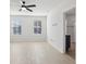 Well-lit bedroom with large windows, neutral walls, and light wood flooring, providing a serene environment at 2604 Knight Island Dr, Brandon, FL 33511