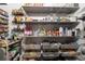 Well-stocked pantry with ample shelving and wire baskets, perfect for storing food and household essentials at 5292 Kernwood Ct, Palm Harbor, FL 34685