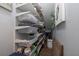 Bright walk-in closet offering multiple shelves and wire basket storage solutions for optimal organization at 5292 Kernwood Ct, Palm Harbor, FL 34685
