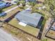 Aerial view of fenced backyard with a cozy patio for relaxing and outdoor activities at 6706 Sierra Ter, New Port Richey, FL 34652