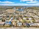 Aerial view of community showing homes nestled among trees and waterways with access to the Gulf at 6706 Sierra Ter, New Port Richey, FL 34652