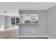 Kitchen featuring granite countertops, modern cabinets, and a breakfast bar at 6706 Sierra Ter, New Port Richey, FL 34652