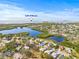 Aerial view showing the community location near the Gulf of Mexico and coastal waterways at 1007 Lake Avoca Dr, Tarpon Springs, FL 34689