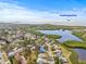 Community aerial view showcasing the Fred Howard Park and beautiful neighborhood and water views at 1007 Lake Avoca Dr, Tarpon Springs, FL 34689