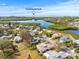 Aerial shot of a neighborhood showcasing the property's proximity to Fred Howard Park at 1007 Lake Avoca Dr, Tarpon Springs, FL 34689