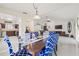 Open concept design features tile floors, a dining area, and access to the kitchen and living room at 1007 Lake Avoca Dr, Tarpon Springs, FL 34689