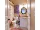 Cozy bathroom featuring decorative shower curtain, vanity and tiled flooring at 102 Brent Cir, Oldsmar, FL 34677