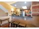 Kitchen featuring granite countertops, stainless steel appliances, and breakfast bar at 102 Brent Cir, Oldsmar, FL 34677