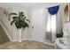 Welcoming foyer with tile flooring, elegant decor, and natural light at 11804 Bluegrass Field Ct, Riverview, FL 33579