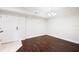 Inviting dining area with wood flooring and bright light fixture, perfect for entertaining guests at 4516 Seagull Dr # 303, New Port Richey, FL 34652
