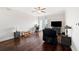 Cozy living room featuring dark hardwood floors, modern furnishings, and lots of natural light at 4516 Seagull Dr # 303, New Port Richey, FL 34652