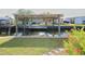 Waterfront dock with boat lift, offering direct water access at 114 W Saint Johns Way, Apollo Beach, FL 33572