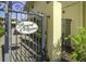 Entrance to Royal Orleans community with decorative gate and lush tropical landscaping at 16333 Gulf Blvd # 105, St Petersburg, FL 33708