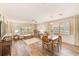 Bright living room with hardwood floors, abundant natural light, and comfortable seating for relaxing and entertaining at 2546 Oakleaf Ln # 35D, Clearwater, FL 33763