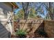 Backyard of the home with privacy wall at 2567 Bentley Dr, Palm Harbor, FL 34684