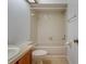 Bright bathroom featuring a shower and tub combination and a skylight at 2567 Bentley Dr, Palm Harbor, FL 34684